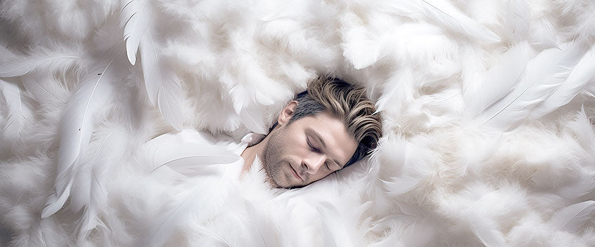huile cbd homme dans lit de plumes blanches