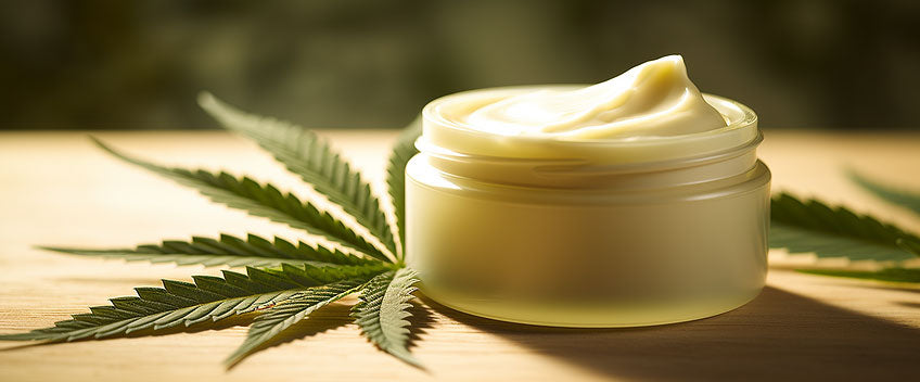 cbd cream on cannabis leaf